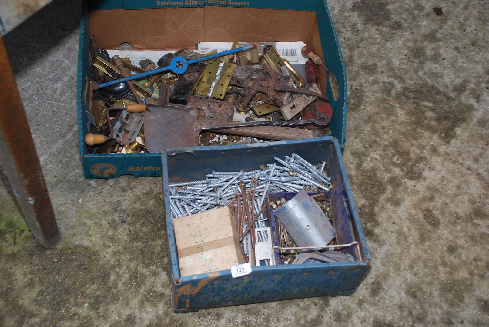 A quantity of brass fittings, door handles, hinges, etc.