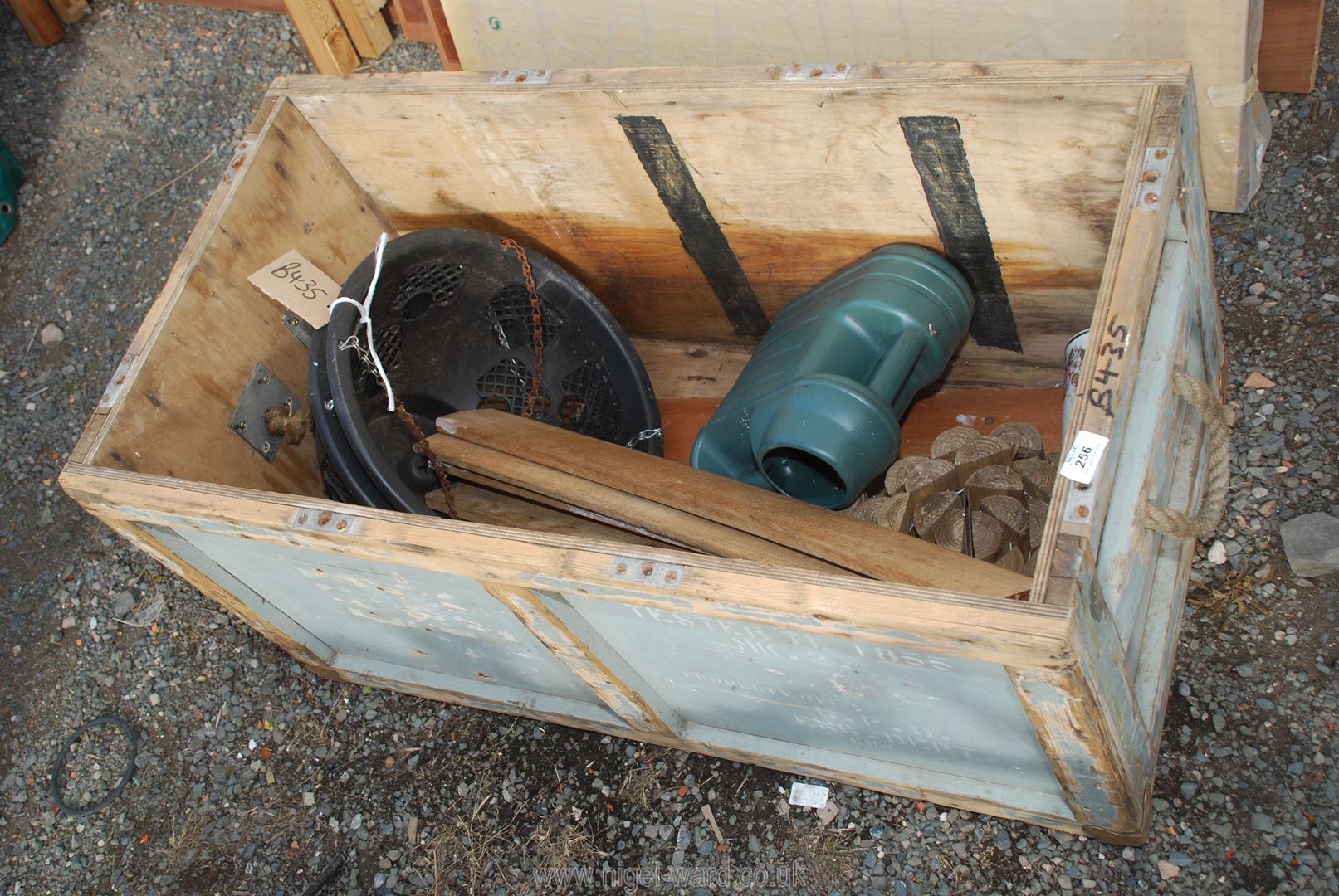 A wooden trunk, garden edging and hanging basket, etc.