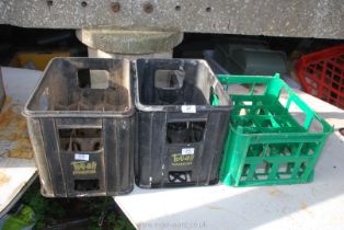 Three plastic milk crates (two from Tovali, Carmarthen).