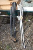 Nylon drain rods and a pair of crutches.
