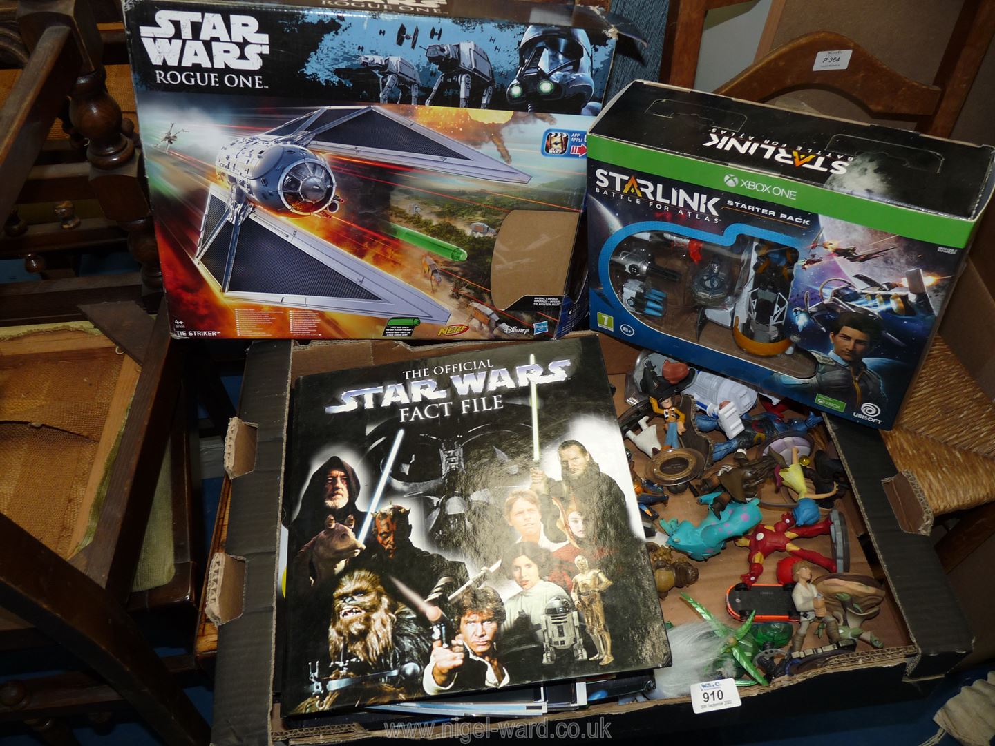 A quantity of children's toys, Star Wars fact file, etc.