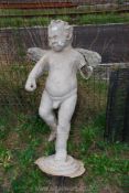 A large fibre glass Cherub, a/f.