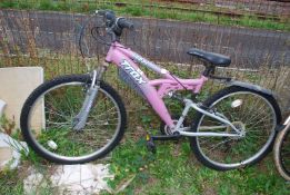 An Apollo Trax TFS1 ladies Mountain Bike with suspension and derailleur gears.