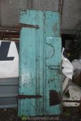 An old blue painted Door with blacksmith hinges, 28 11/2'' wide x 70'' high.
