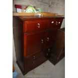 A cupboard with 4 drawers, 35" wide x 4ft high x 15" deep.