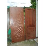Two doors, one hardwood 30'' x 78'', the other wood-grain finished 29'' wide x 78'' high.