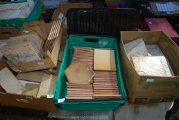 Four boxes of tiles, various sizes and patterns.