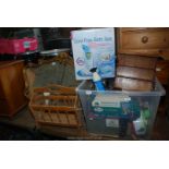 A magazine rack, miscellaneous tins, miniature dresser, etc.