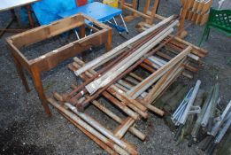 Twelve sections of scaffolding with braces and a table base.