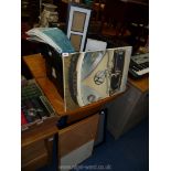 A box of photo frames, curtains, canvas, memo boards, etc.