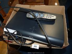 A Sky+ HD box with cable and remote.