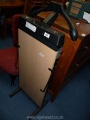 A 'Corby 3300' trouser press.