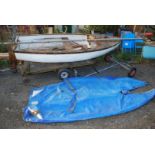A glass fibre hulled sailing dinghy for restoration with 17' 2" high aluminium mast, fittings,