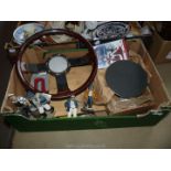 A box of miscellanea including steering wheel, cooker element, four figures, etc.