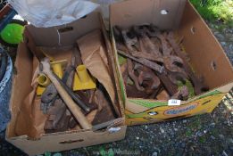 Two boxes of old spanners, stilsons, chisels, etc.