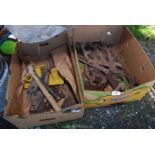 Two boxes of old spanners, stilsons, chisels, etc.