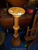 A light oak jardiniere stand, 38 1/2" tall.