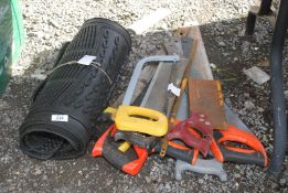 Rubber car mats and a quantity of wood saws, etc.