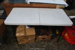 A folding table 4' x 2'.