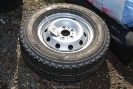 A wheel and Bridgestone tyre (new), 215/70R15.