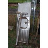 A stainless steel Sink top with double draining board, 59'' x 20'' and wooden "T" bar.