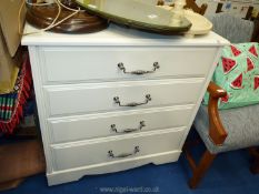 A white painted chest of drawers, 36" x 34" x 16".