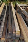Ten lengths of softwood 4" x 3" x 189" long.