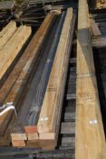 Eleven lengths of softwood mostly 2 3/4" x 1 3/4" x 122" long.