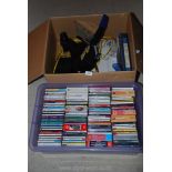 A box of miscellaneous cd's, office equipment, industrial stapler, etc.