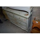 A chest of drawers having painted rose design, 41" wide x 20" deep x 34" high.