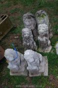 Six concrete garden lions.