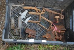 A tray of gate hinges and catches.