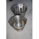 Two stainless steel buckets.