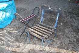 A folding stool and a wrought iron framed wooden slatted chair, a/f.