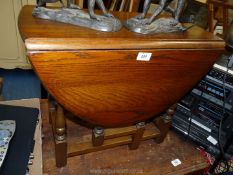 A small drop leaf occasional table.
