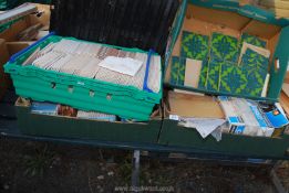 Four boxes of tiles, various sizes and patterns.