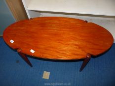 An oval topped Lounge Table, 42'' long x 19 3/4'' wide x 17'' high.