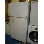 A large industrial fridge, 64 1/2'' high x 29 1/2'' wide x 32'' deep.