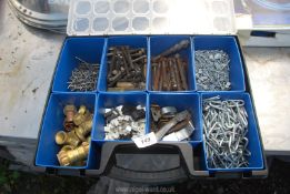 Plastic box of rawl bolts, staples, nails, copper fittings, etc.