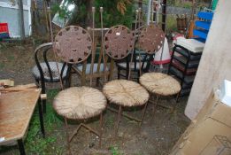 Three metal high back chair with seagrass seats, hand forged.