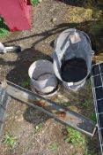 A galvanised coal bucket, chicken drinker and long feeder.