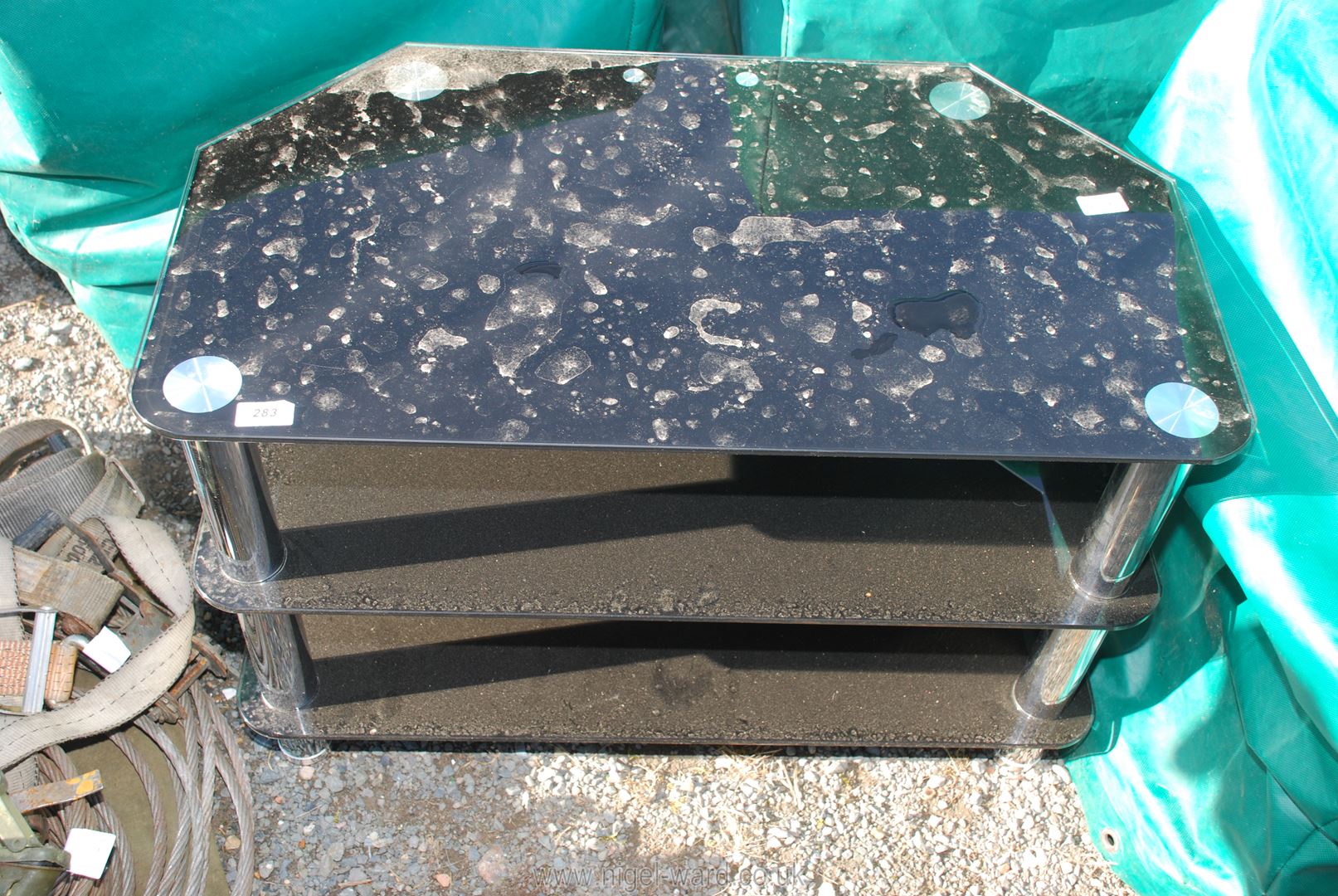 A black glass TV unit.