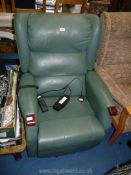 A green faux leather electric recliner.