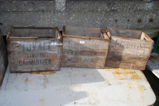 Three wooden bottle Crates including Tovali, Carmarthen and D.C. Davies, Cross Hands.