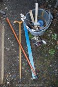 Two buckets containing sockets, hammers, bolster chisels, two walking sticks, etc.