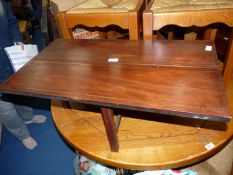 A drop leaf occasional table with marquetry detail.