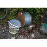 A large roll of plain galvanised wire, tub of UniBond tile adhesive, carpenter's vice, 4" vice, etc.