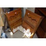 A pair of pine shelves with china drawers.