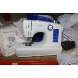 An Elitech sewing machine.