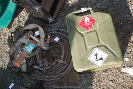 A military jerry can 1992, wire rope with hooks and 2 ratchet straps.